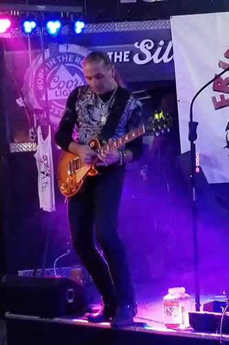 petio petev playing guitar - friendly jesture