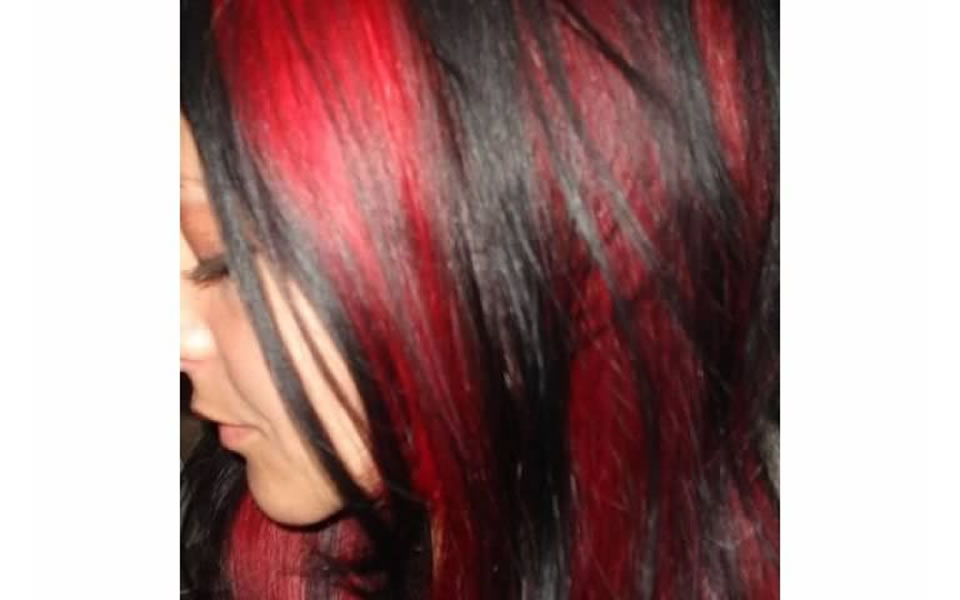 woman with red and black hair-do