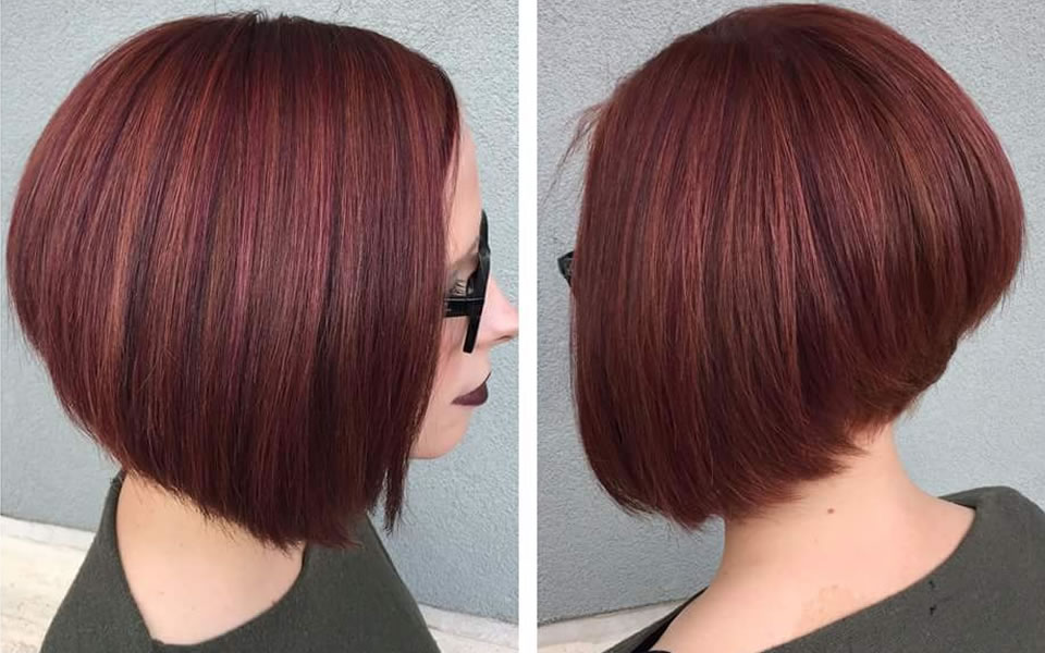 side and rear view of a short womens hair cut with red color