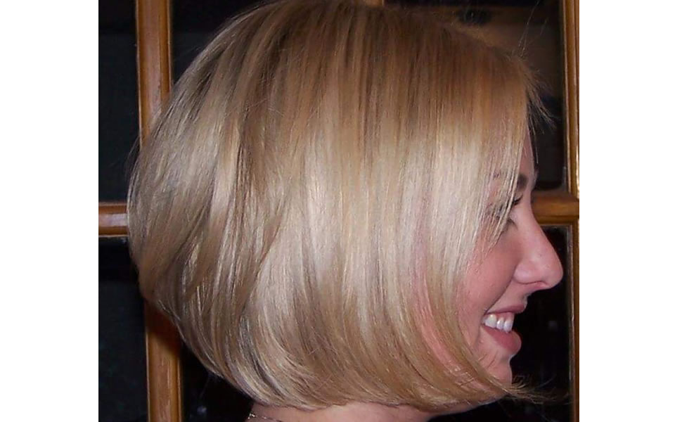 profile view of a short womens hair cut blonde